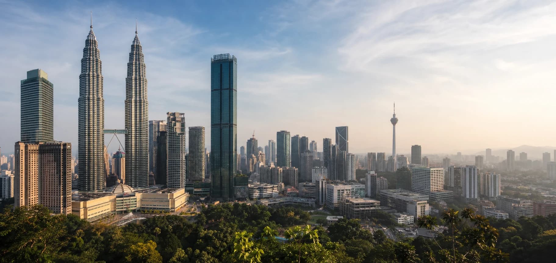Panoramic Kuala Lumpur skyline in warm morning light